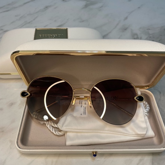 Boucheron sunglasses NEW. Gold, grey